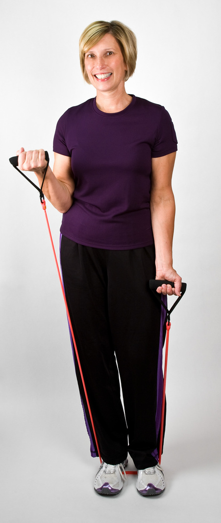 Physically Fit Women Working Out With Resistance Bands